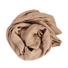 Bain en coton de bambou teint dans une serviette enveloppée de gaze